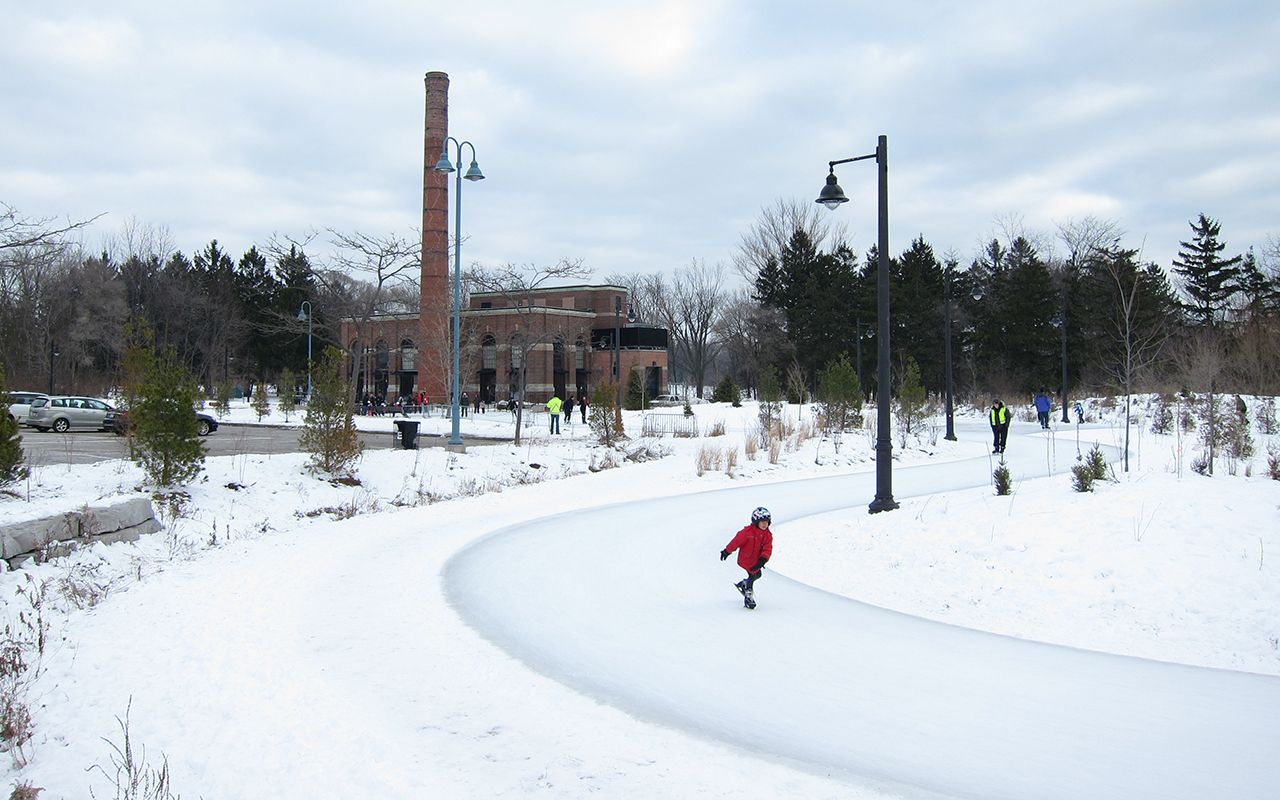 A child skating on the skating trail