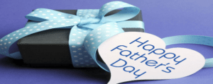 A gift box with a tag reading "Happy Father's Day".