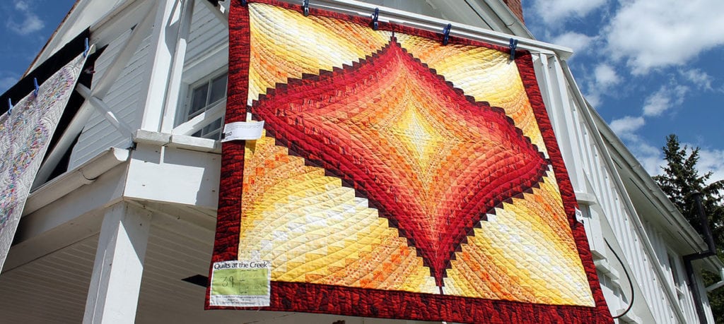 A quilt on display.
