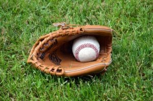 A baseball in a mitt.
