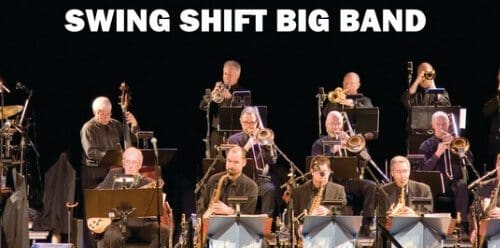 Members of the big band performing.