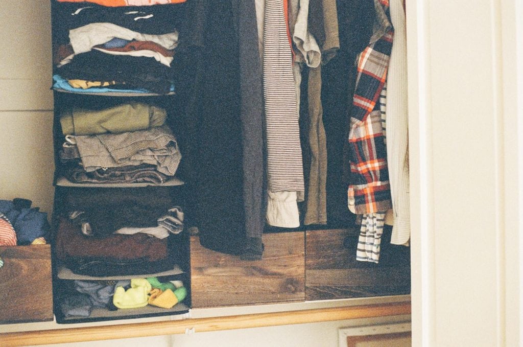 A closet full of clothes.