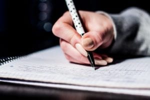Someone writing.
