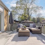 walkout from dining room to a beautiful deck overlooking the backyard at 10 woodbury place