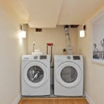 laundry area with front loading washer and dryer at 10 woodbury place
