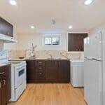 convenient lower level kitchen perfect for nanny or inlaws at 10 woodbury place