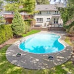 Spectacular Drone photograph of rear facade and concrete pool at 1370 Islington Avenue
