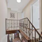 Original Iron railing and upper level landing at 1370 Islington Avenue