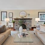 Original stone fireplace in the living room at 1370 Islington Avenue