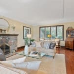 Living room and sitting area with leaded glass windows at 1370 Islington Avenue