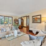 Living room with original French doors overlooking foyer at 1370 Islington Avenue