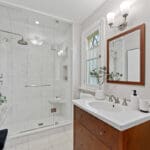 Main bathroom with glass enclosed shower at 1370 Islington Avenue