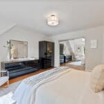 Primary bedroom with large walk-in closet with mirrored doors at 1370 Islington Avenue