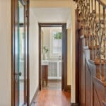 Staircase and powder room at 1370 Islington Avenue