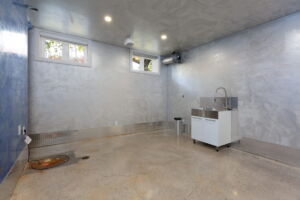 Dedicated lower-level brew room at 28 Martin Grove Road featuring a spacious layout and polished concrete flooring